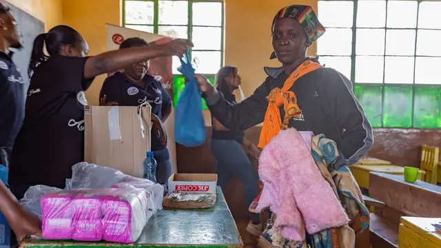 Maua receiving a donation's package