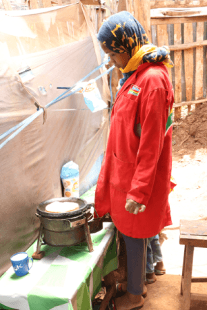 Anifa Juma making some chapatis